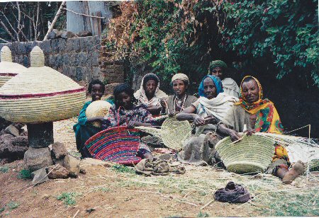 Ethiopian women weaving traditional baskets